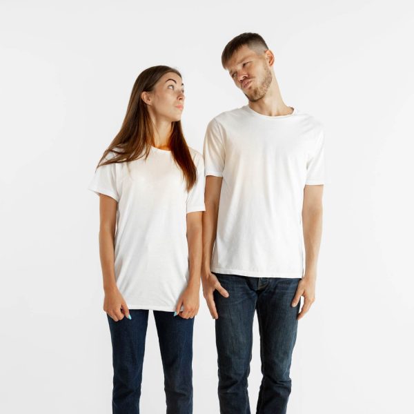 beautiful-young-couple-s-portrait-isolated-white-studio-background-facial-expression-human-emotions-advertising-concept-man-woman-standing-looking-each-other